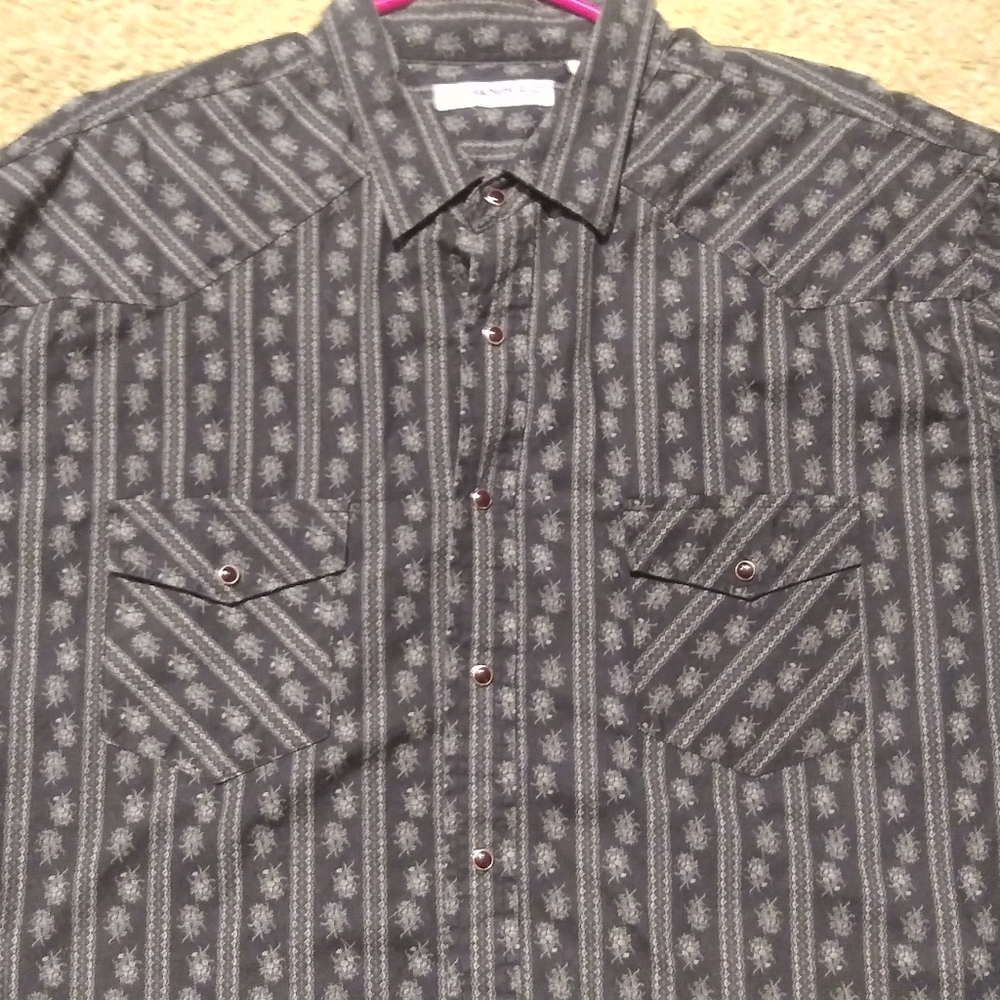 I'm selling an anchor blue pearl snap XXL black floral button up shirt.
